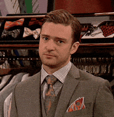 Justin Timberlake blankly staring straight at the camera GIF